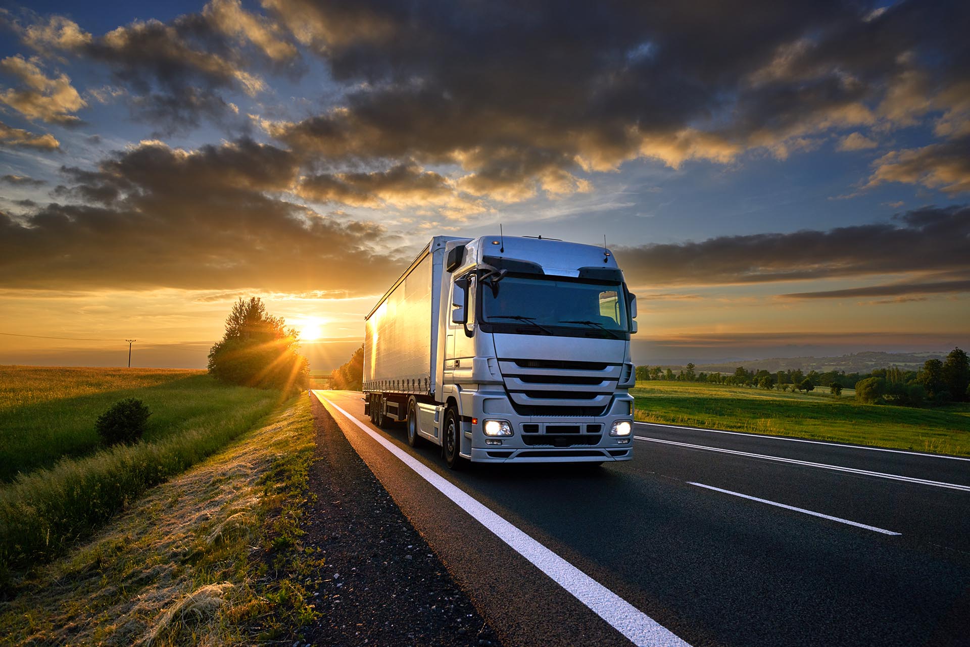 Truck driving on asphalt road